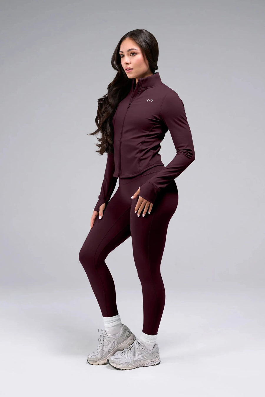 Side View Of Tempo High Waisted Workout Leggings in Wine