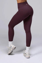 Side View Of Tempo High Waisted Workout Leggings in Wine