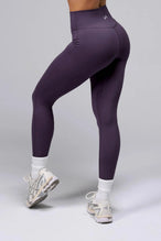 Side View Of Tempo High Waisted Workout Leggings in Grape Color