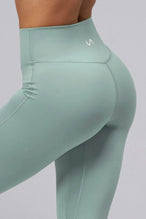 Back View Of Tempo High Waisted Workout Leggings in Sage Green