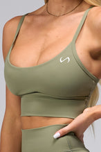 Detail Front View Of Tempo Multi-Back Strap Sports Bra in Vineyard Green
