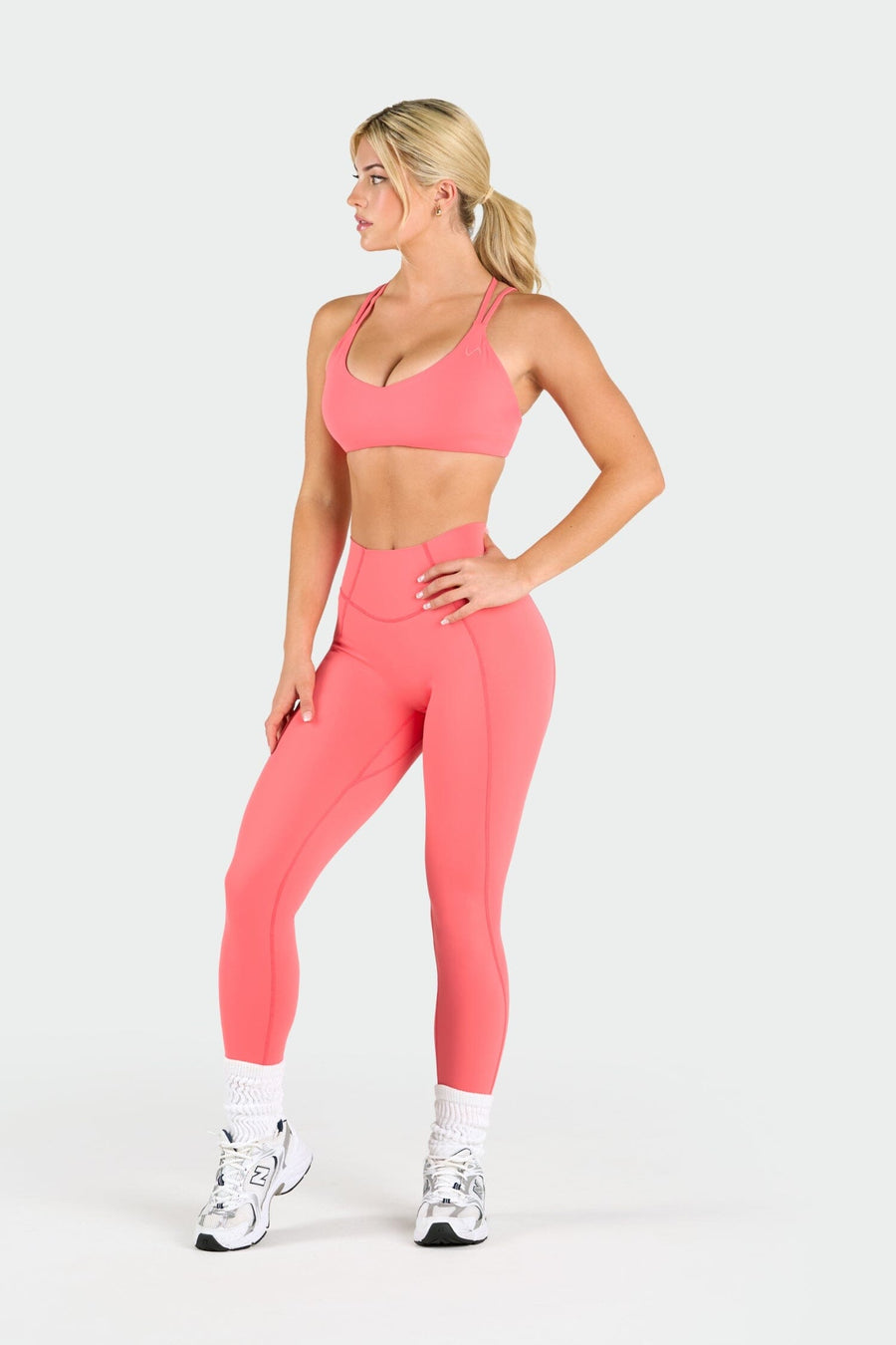 Front View of Hot Coral Tempo Scrunch Butt Leggings