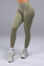 Front View of Brown TLF Tempo Scrunch Butt Leggings, featuring a butt scrunch that shapes your glutes with a snatched waist seam design 