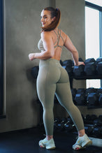 Back View of Brown TLF Tempo Scrunch Butt Leggings, featuring a butt scrunch that shapes your glutes with a snatched waist seam design 