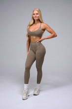 Front View of Brown TLF Tempo Scrunch Butt Leggings, featuring a butt scrunch that shapes your glutes with a snatched waist seam design 