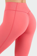 Back View of Hot Coral Tempo Scrunch Butt Leggings