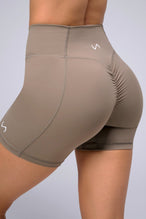 Back View of Brown TLF Tempo Scrunch Butt Shorts, featuring a butt scrunch that shapes your glutes with a snatched waist seam design 