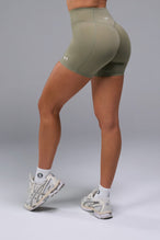 Back View of Brown TLF Tempo Scrunch Butt Shorts, featuring a butt scrunch that shapes your glutes with a snatched waist seam design 