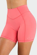 Front View of Hot Coral Tempo Scrunch Butt Shorts