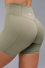 Back View of Brown TLF Tempo Scrunch Butt Shorts, featuring a butt scrunch that shapes your glutes with a snatched waist seam design 