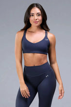 Front View of Blue TLF Tempo Strappy Back Sports Bra, featuring a minimal design for the gym and lifestyle wear 