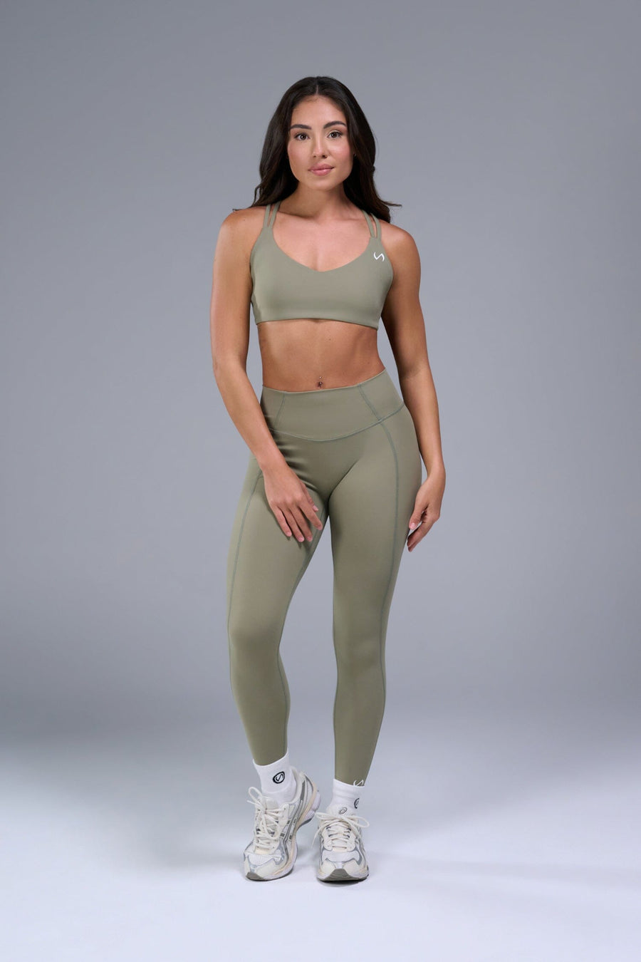 Front View of Brown TLF Tempo Strappy Back Sports Bra, featuring a minimal design for the gym and lifestyle wear 