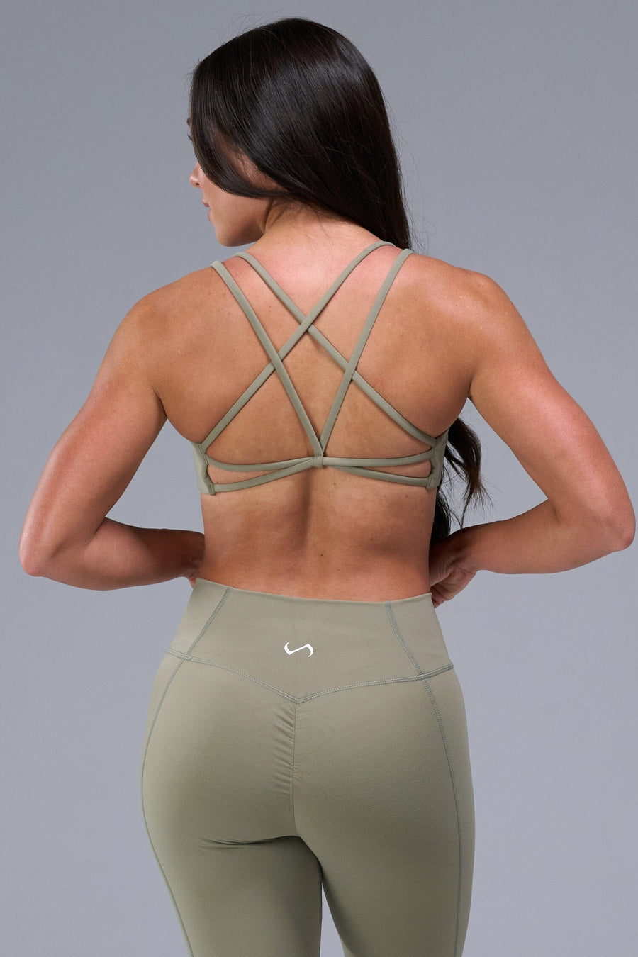 Back View of Brown TLF Tempo Strappy Back Sports Bra, featuring a minimal design for the gym and lifestyle wear 