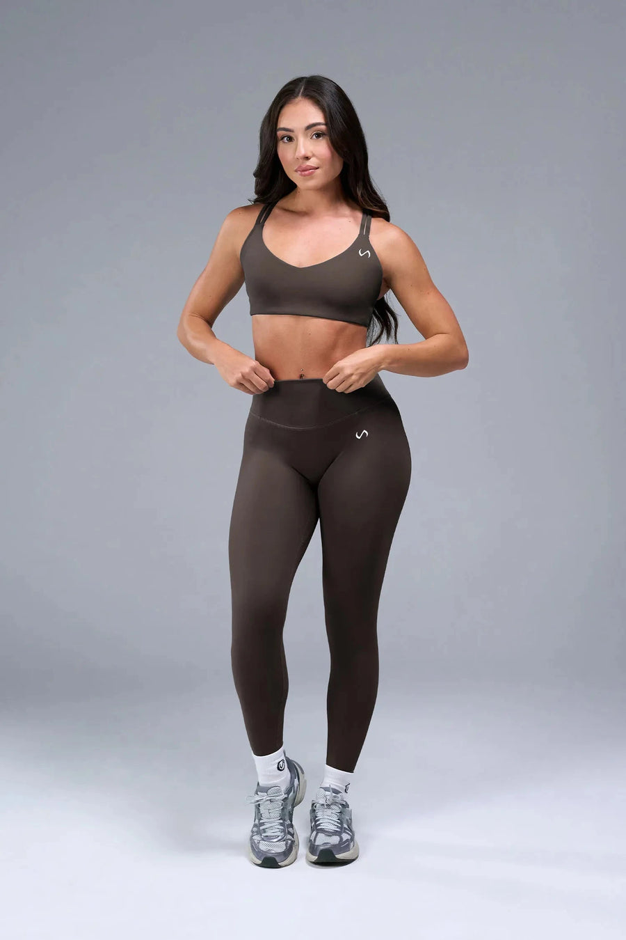 Front View of Brown TLF Tempo Strappy Back Sports Bra, featuring a minimal design for the gym and lifestyle wear 