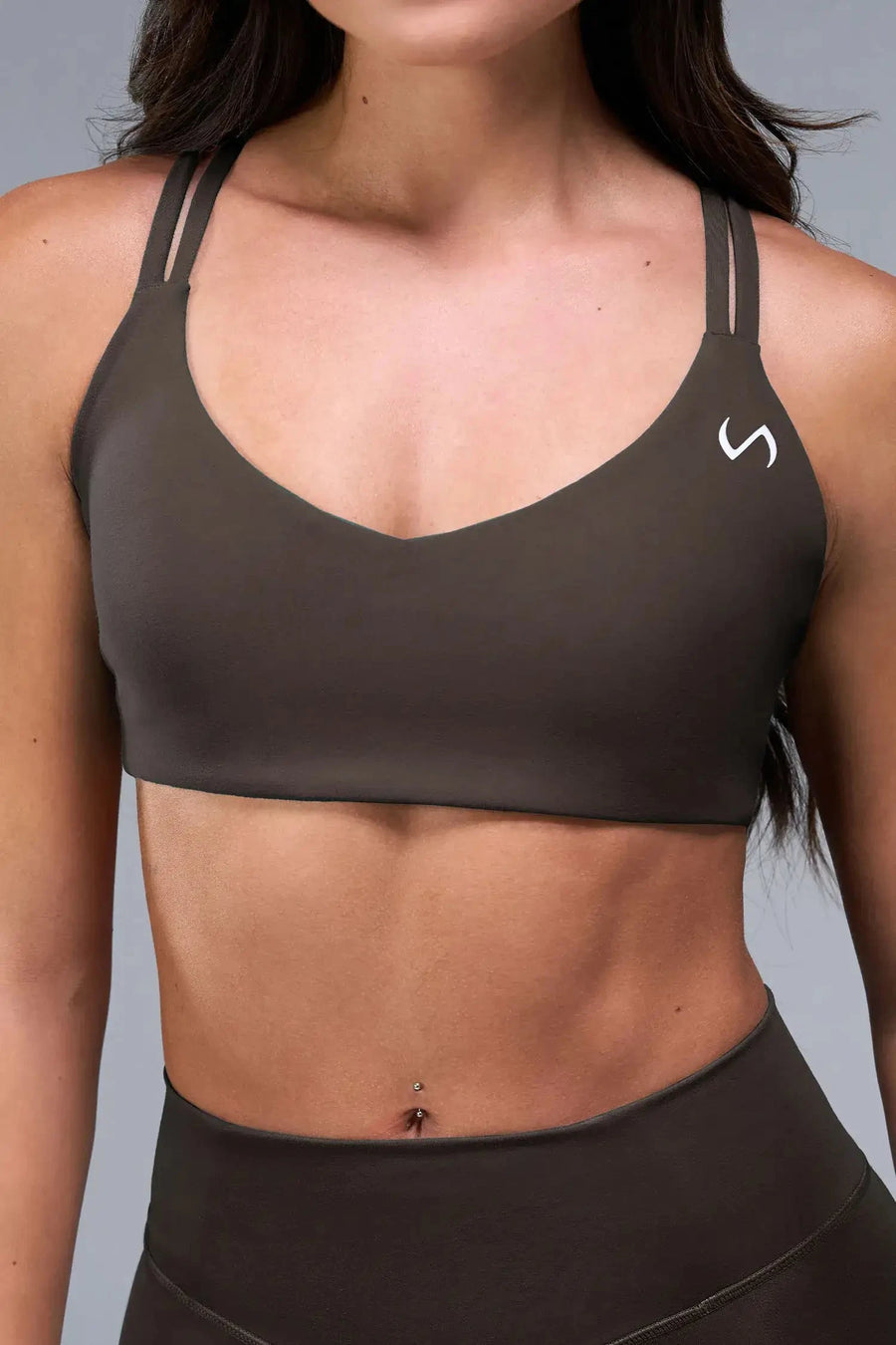 Front View of Brown TLF Tempo Strappy Back Sports Bra, featuring a minimal design for the gym and lifestyle wear 
