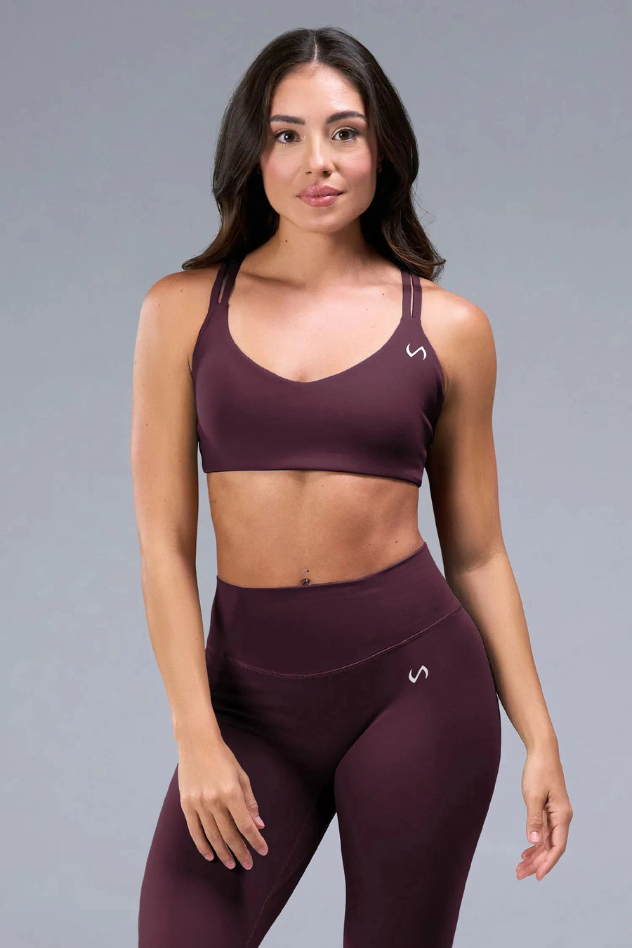 Front View of Wine TLF Tempo Strappy Back Sports Bra, featuring a minimal design for the gym and lifestyle wear 