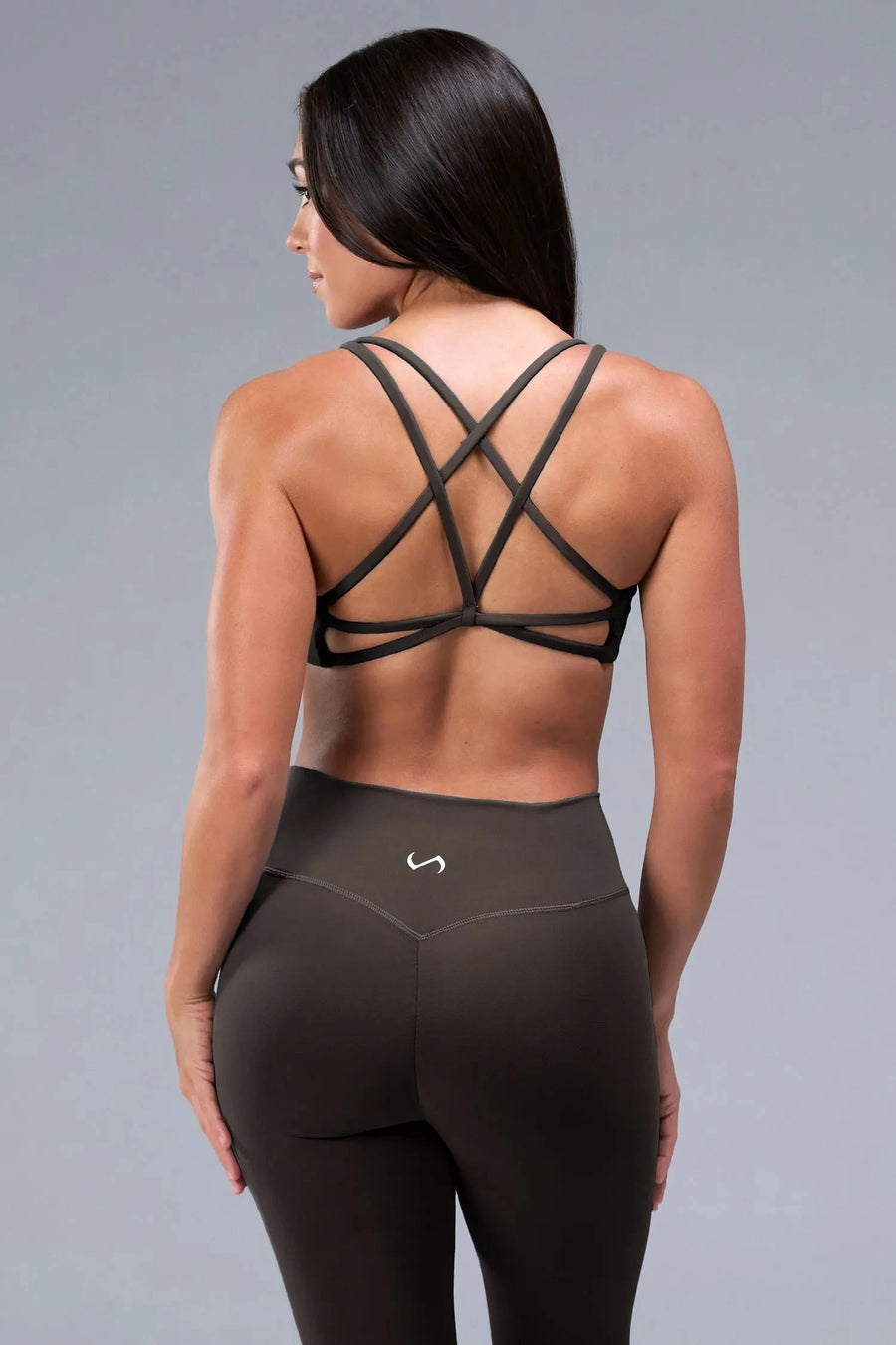 Back View of Brown TLF Tempo Strappy Back Sports Bra, featuring a minimal design for the gym and lifestyle wear 