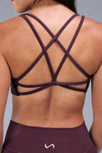 Back View of Wine TLF Tempo Strappy Back Sports Bra, featuring a minimal design for the gym and lifestyle wear 