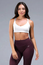 Back View of White TLF Tempo Strappy Back Sports Bra, featuring a minimal design for the gym and lifestyle wear 