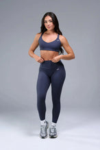 Front View of Blue TLF Tempo Strappy Back Sports Bra, featuring a minimal design for the gym and lifestyle wear 