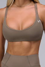 Front View of Brown TLF Tempo Strappy Back Sports Bra, featuring a minimal design for the gym and lifestyle wear 