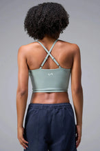Back View Of Tempo Tank Bra in Sage Green, provides the support and flexibility you need to perform and look your best.