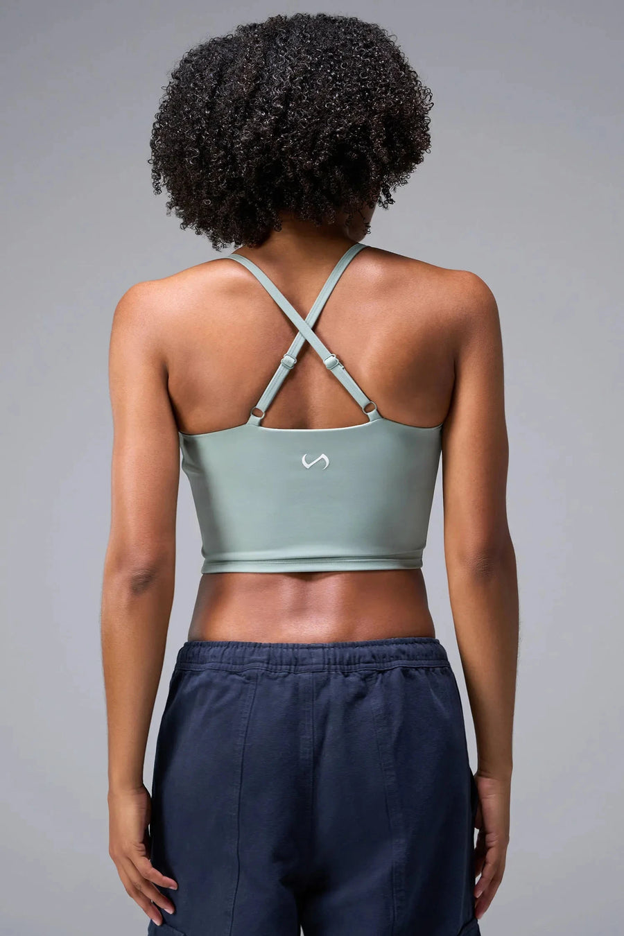 Back View Of Tempo Tank Bra in Sage Green, provides the support and flexibility you need to perform and look your best.