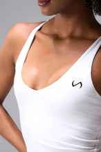 Front View Of Tempo Tank Bra in White,, provides the support and flexibility you need to perform and look your best.