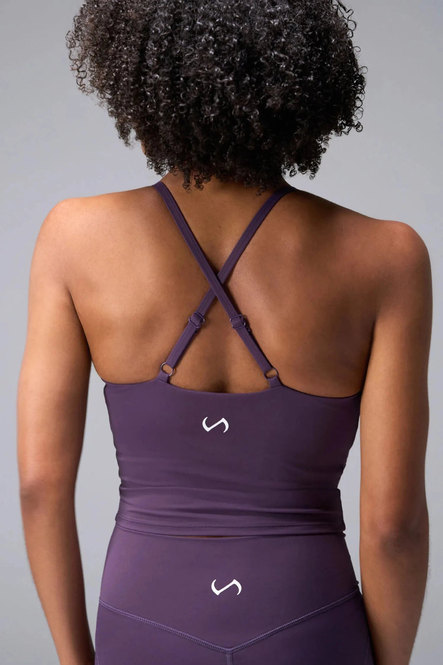 Back View Of Tempo Tank Bra in Dark Grape, provides the support and flexibility you need to perform and look your best.