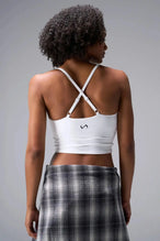 Back View Of Tempo Tank Bra in White, provides the support and flexibility you need to perform and look your best.