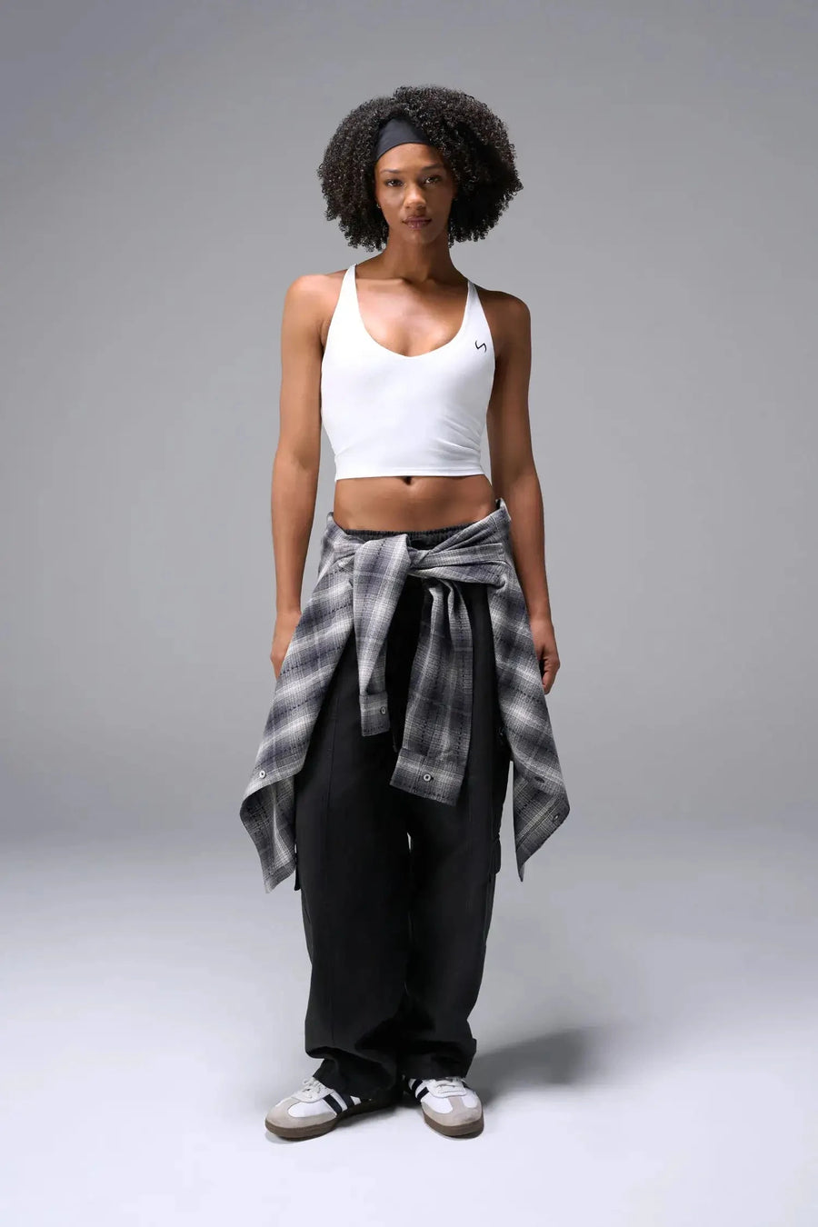 Front View Of Tempo Tank Bra in White, provides the support and flexibility you need to perform and look your best.