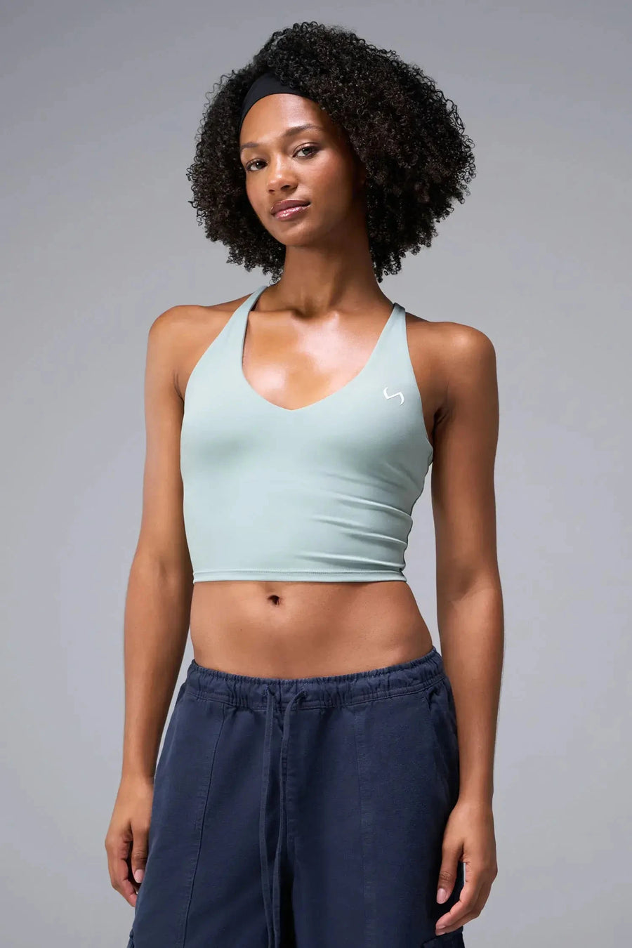 Front View Of Tempo Tank Bra in Sage Green, provides the support and flexibility you need to perform and look your best.