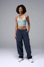 Front View Of Tempo Tank Bra in Sage Green, provides the support and flexibility you need to perform and look your best.