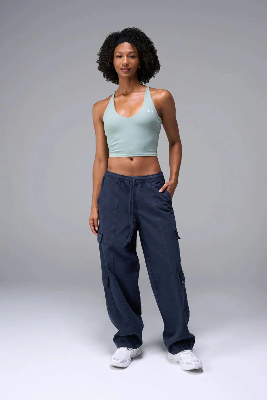 Front View Of Tempo Tank Bra in Sage Green, provides the support and flexibility you need to perform and look your best.