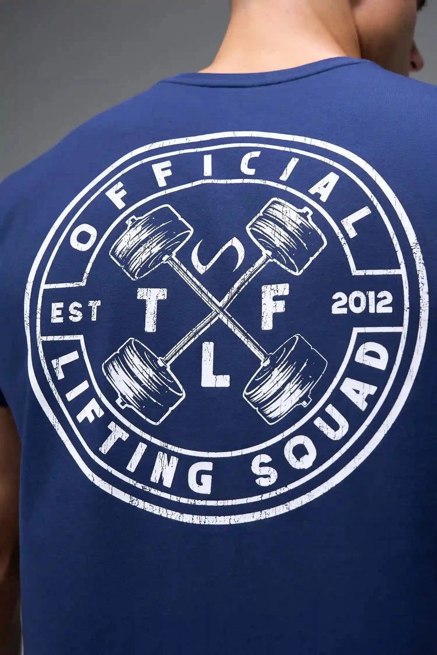 Back View of Blue TLF Cross weights Swole Tee featuring our swole fit and custom graphic print design on center back