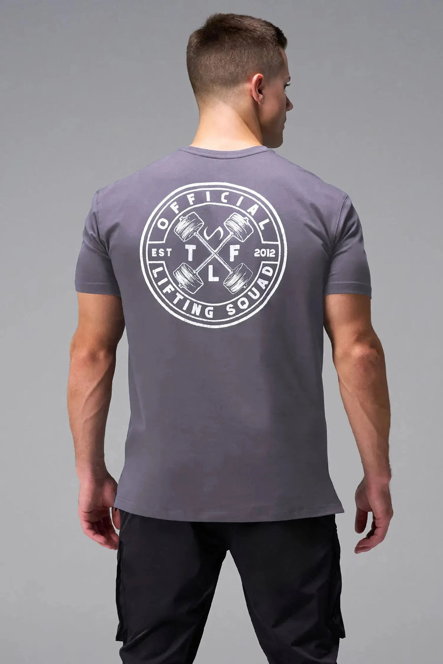 Back View of Purple TLF Cross weights Swole Tee featuring our swole fit and custom graphic print design on center back