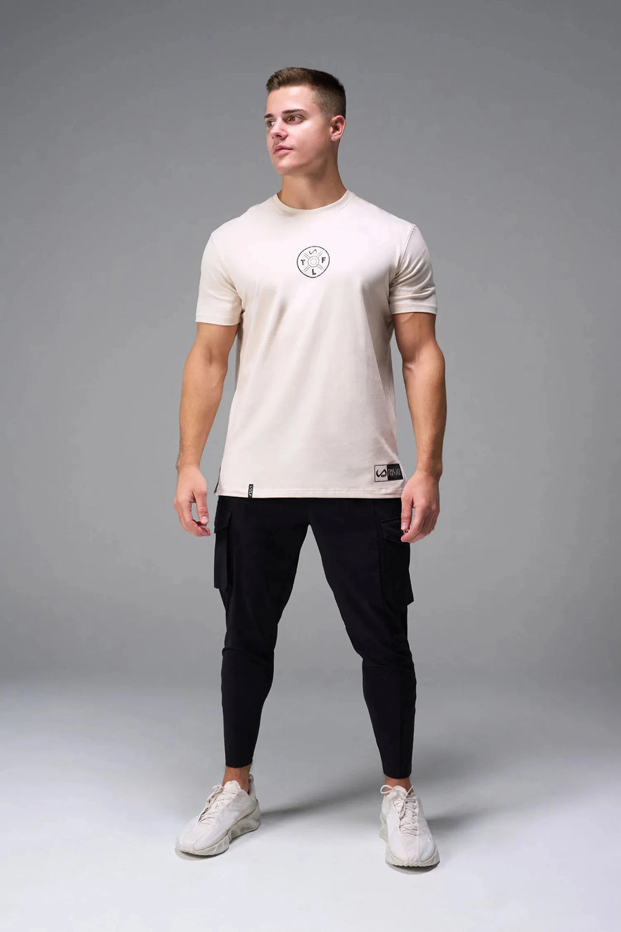 Front View of Oatmilk TLF Cross weights Swole Tee featuring our swole fit and custom graphic print design on center back