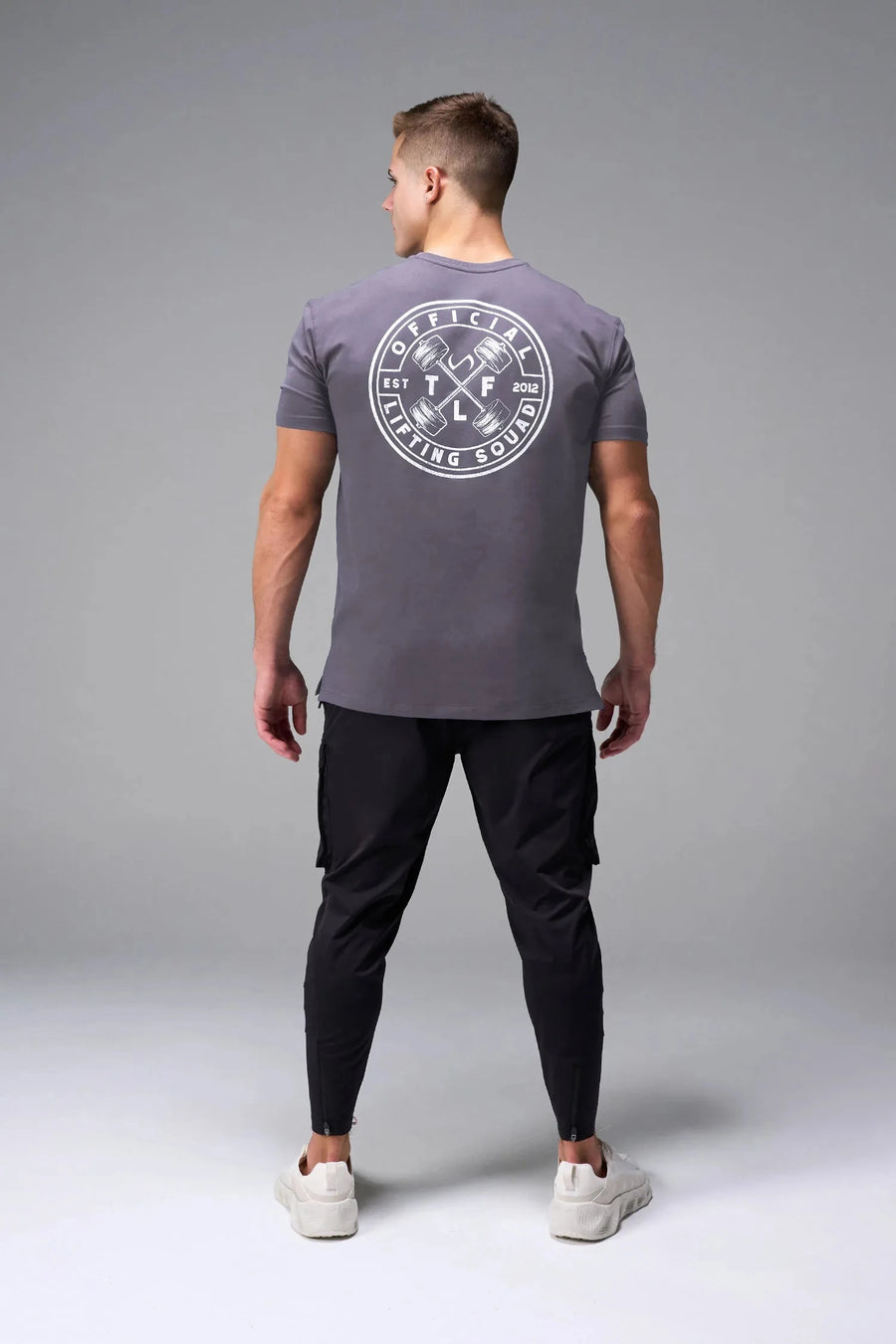 Back View of Purple TLF Cross weights Swole Tee featuring our swole fit and custom graphic print design on center back