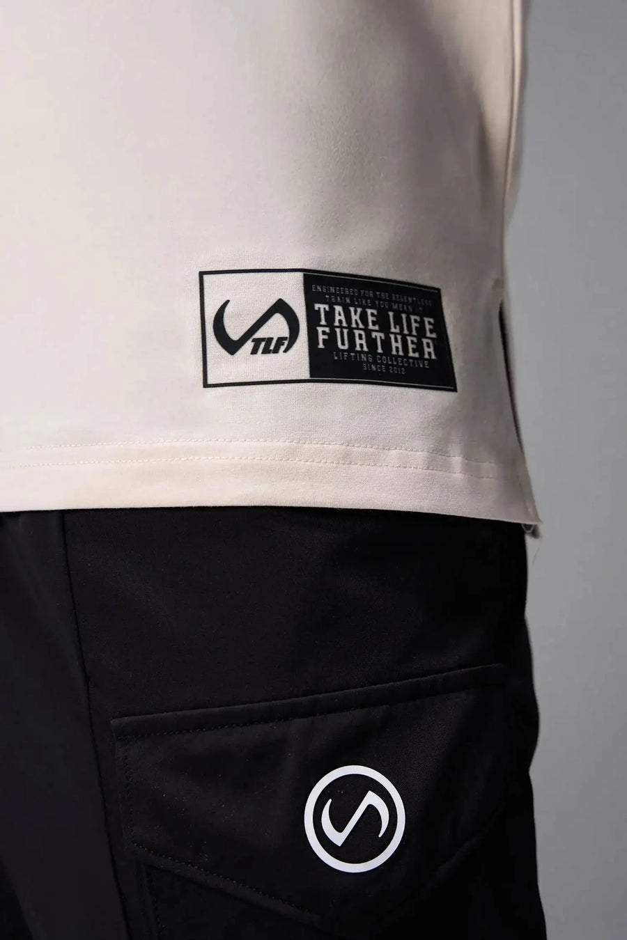 Front View of Oatmilk TLF Cross weights Swole Tee featuring our swole fit and custom graphic print design on center back