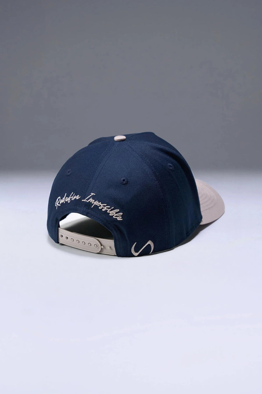 Back View Of TLF x NR Snapback Flipped Script Hat in Blue And Beige