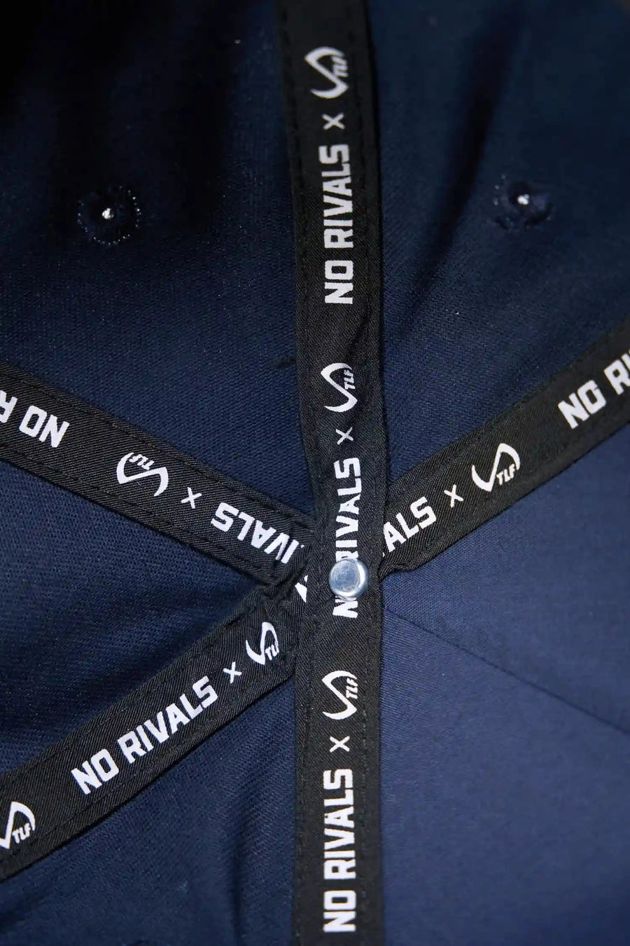 Detail View Of TLF x NR Snapback Flipped Script Hat in Blue And Beige
