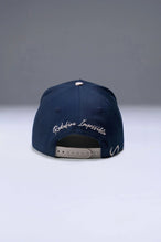 Back View Of TLF x NR Snapback Flipped Script Hat in Blue And Beige