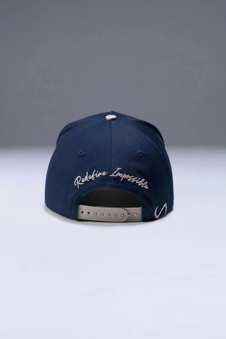 Back View Of TLF x NR Snapback Flipped Script Hat in Blue And Beige