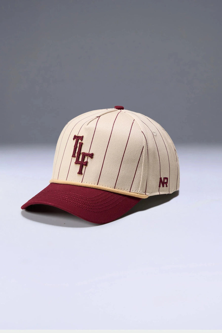 Front View Of TLF x NR Snapback Pinstripe Hat in Natural And Wine Color