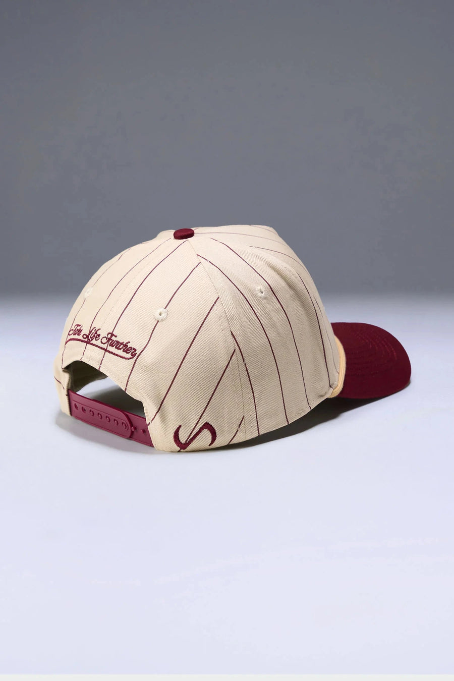 Side View Of TLF x NR Snapback Pinstripe Hat in Natural And Wine Color