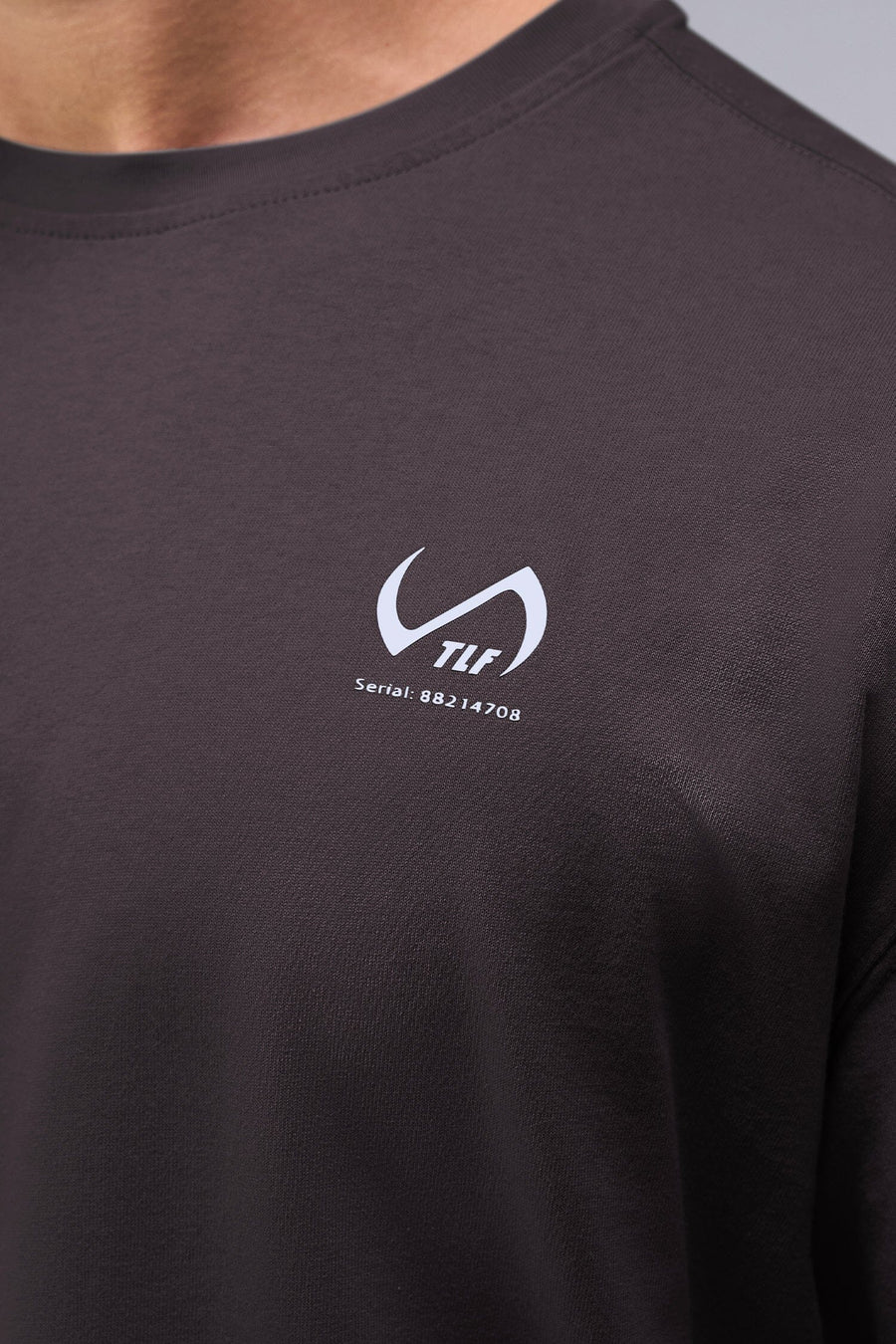 Detail Front View Of Black Stonewash TLF TM Dura Cotton Oversized Tee