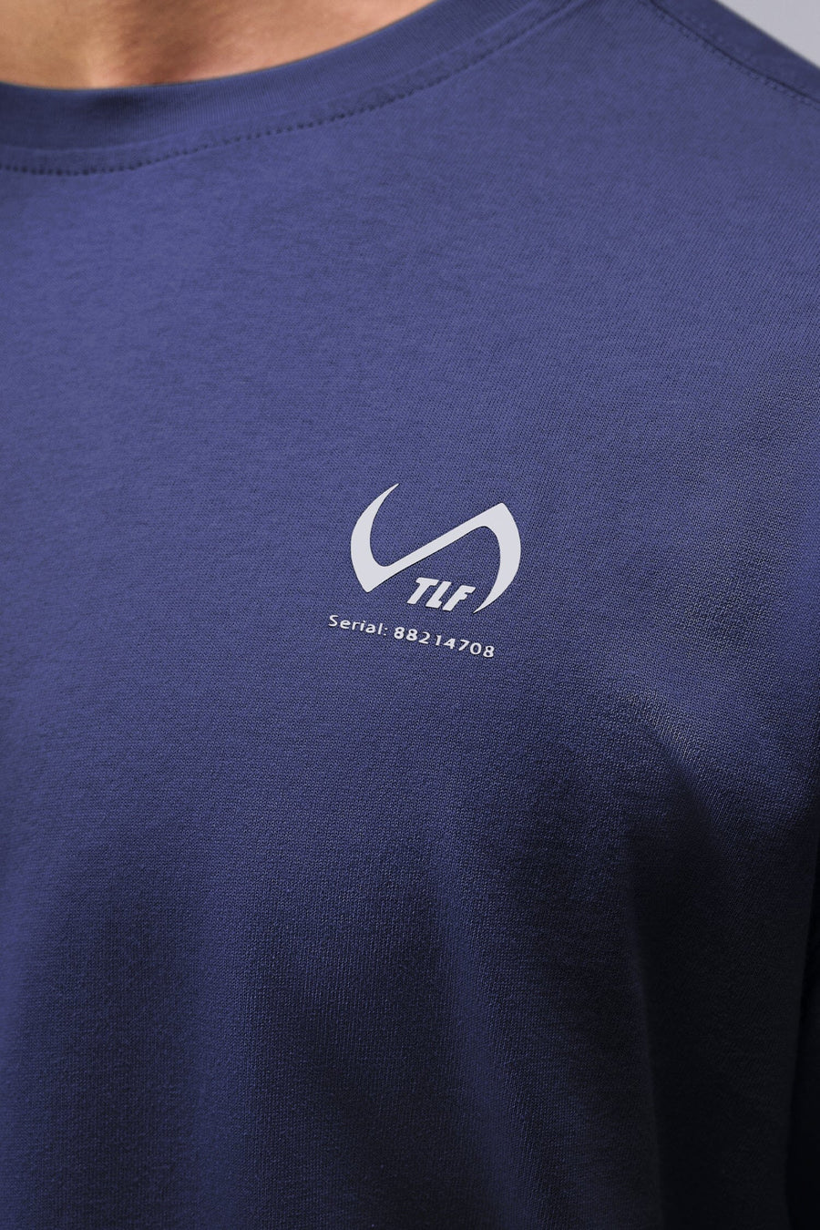 Detail Front View Of Blue Stonewash TLF TM Dura Cotton Oversized Tee