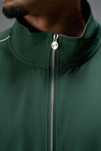 Front View of Green TLF Track Jacket (Men’s GTS Gym-To-Street Edition) with mesh lining, reflective piping, and premium trims for all-day Gym-To-Street wear. 
