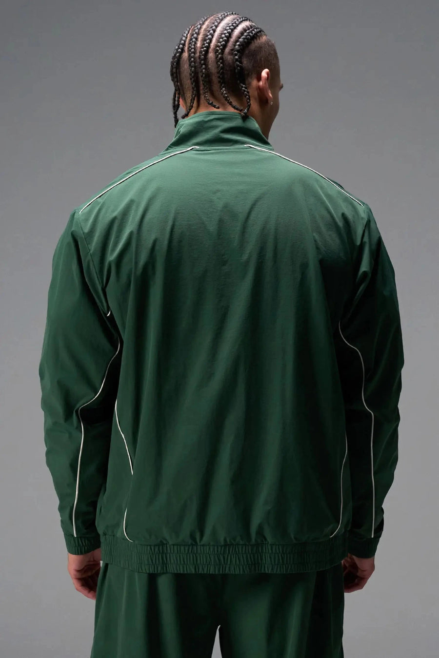 Back View of Green TLF Track Jacket (Men’s GTS Gym-To-Street Edition) with mesh lining, reflective piping, and premium trims for all-day Gym-To-Street wear. 