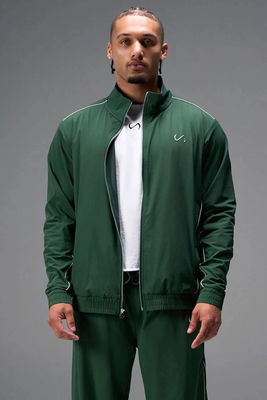 Front View of Green TLF Track Jacket (Men’s GTS Gym-To-Street Edition) with mesh lining, reflective piping, and premium trims for all-day Gym-To-Street wear. 